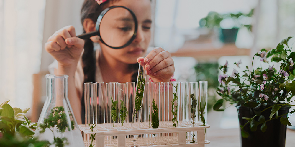 Female student exploring botany, STEM role model